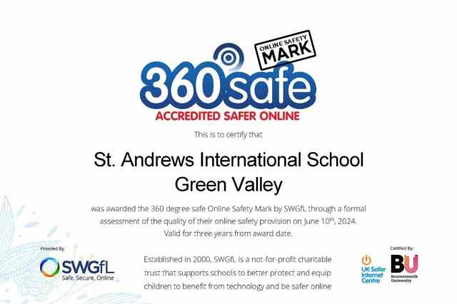 A Green Valley teacher guides a young child during a creative activity, nurturing curiosity and confidence