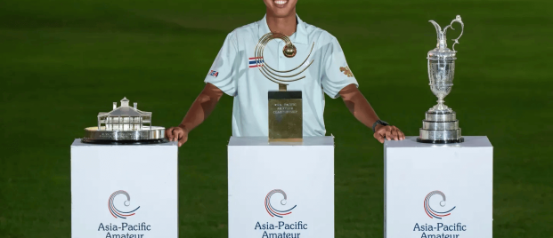 Fifa Laopakdee, the first Thai to win the Asia-Pacific Amateur Championship, stands proudly with the championship trophies at Emirates Golf Club in Dubai.
