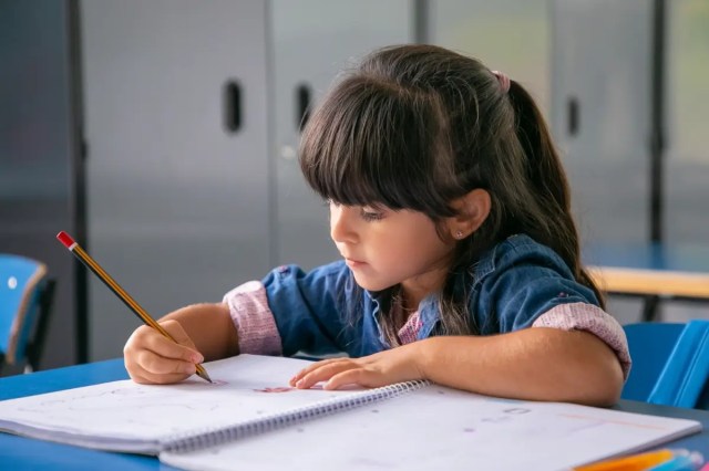 mindfulness-for-tudents Young girl demonstrating mindfulness for students by focusing calmly on a classroom activity.