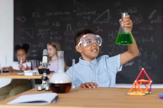 science-experiment-as-part-of-steam-education Student conducting a science experiment as part of STEAM Education.