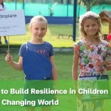 Student relaxing at desk with headphones, illustrating emotional resilience in children during independent study time.