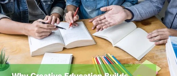 Students collaborating on a classroom project, demonstrating creative education benefits through teamwork and discussion.