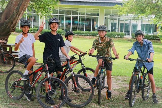 students-enjoying-mountain-biking Group of secondary school students enjoying mountain biking as part of their school sports programme