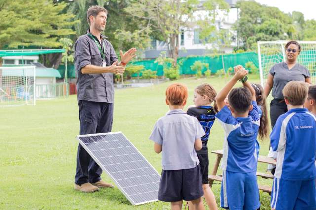 students-learning-about-solar-energy Students learning about solar energy as part of their eco school programme at St. Andrews Green Valley