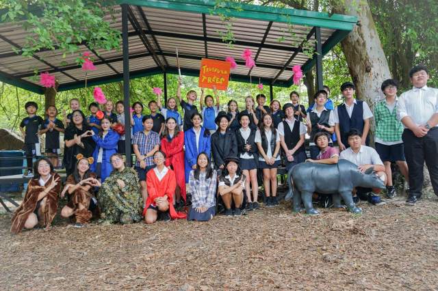 students-present-an-eco-themed Year 9 students present an eco-themed performance about animal conservation for younger students as part of their eco school programme