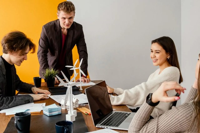 Team collaborating on a project, developing skills for high-demand careers.