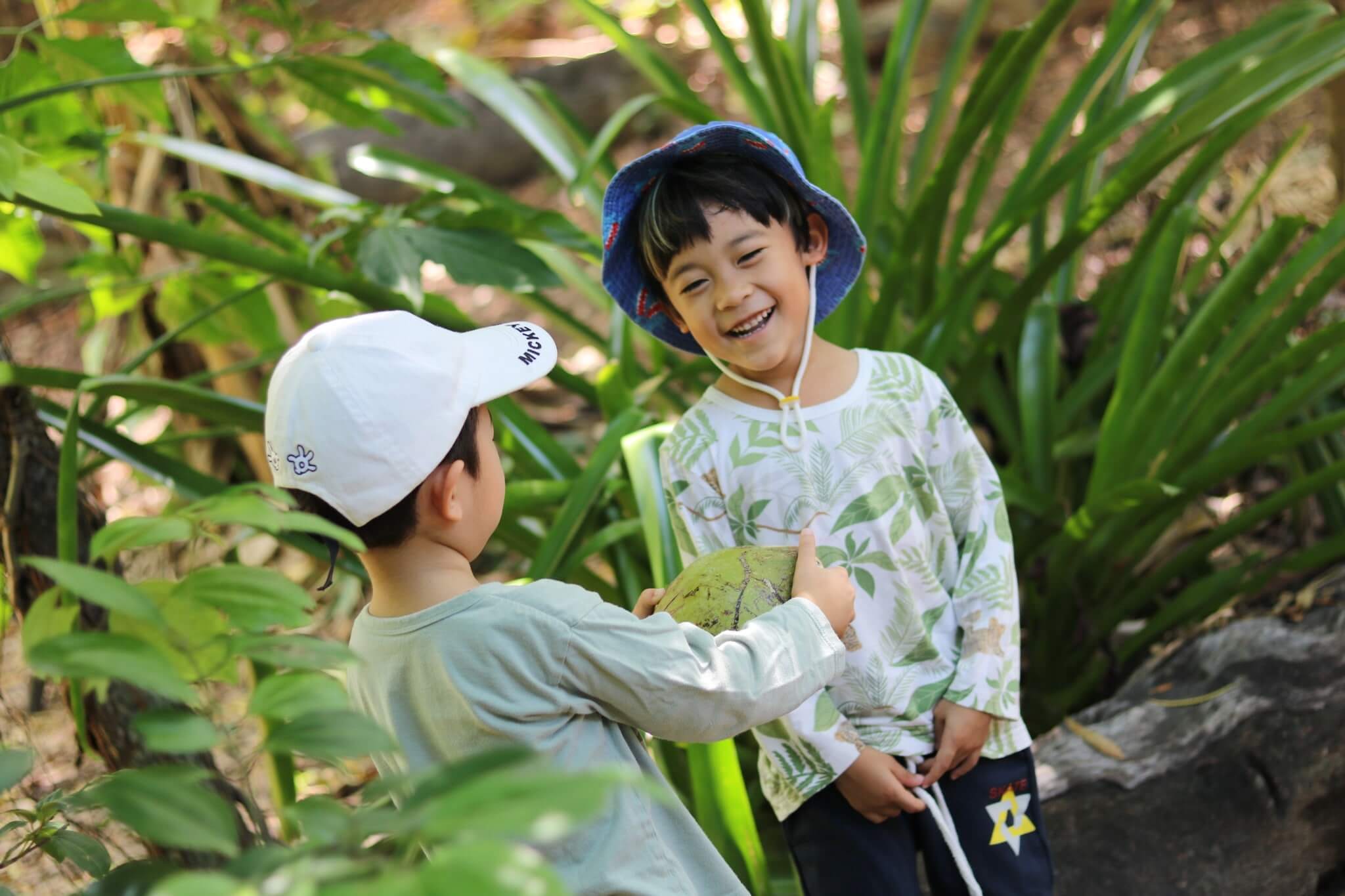 Forest School students at St. Andrews Green Valley engage in joyful peer interaction while exploring nature, developing social adaptability, empathy, and curiosity through authentic forest school experiences.