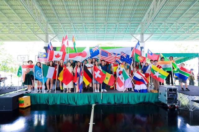 global-citizenship_715f82 St. Andrews Green Valley students wave international flags from around the world during an international day celebration, preparing for future-ready and global citizenship at university for international students.