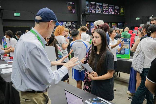 ibpd-decisions Students engage with staff during a guidance event, showing support that shapes confident IBPD decisions at Green Valley.