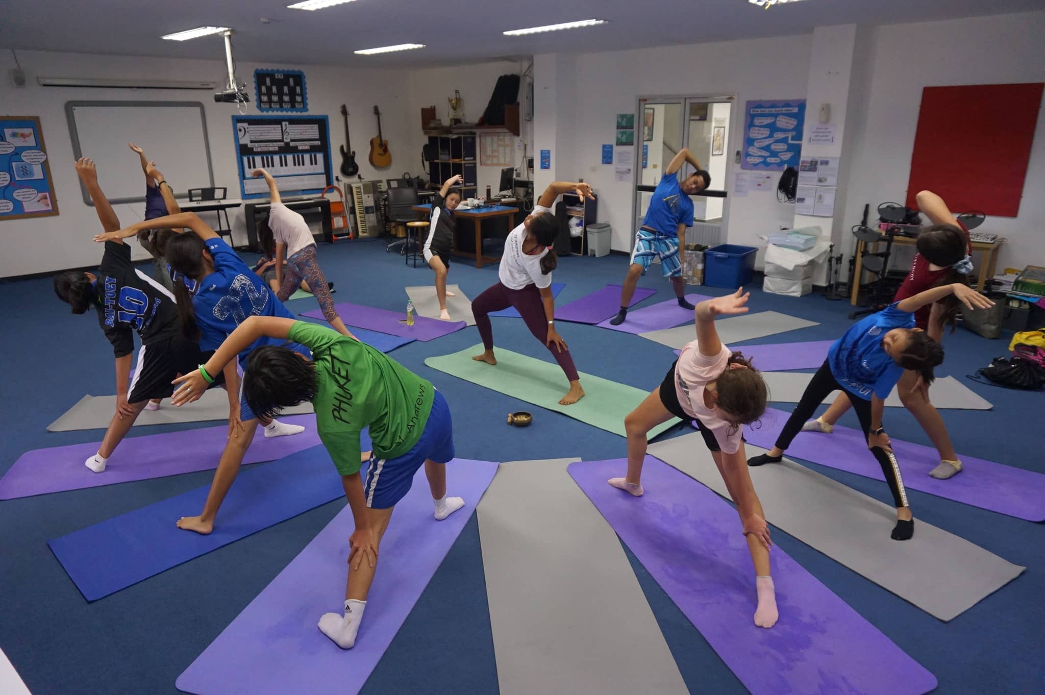 school-well-being-programme a group of St. Andrews Green Valley students practicing yoga as a part of the school's wellbeing programme.