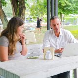 A student consults with a teacher on one-on-one Green Valley's university placement programme.