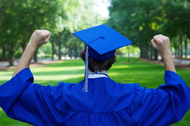 Graduate celebrating academic achievement from one of Ivy League schools.