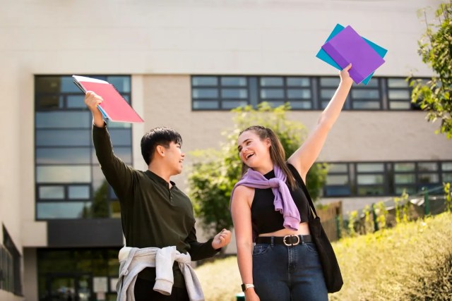 Students building confidence through 21st century skills in education.