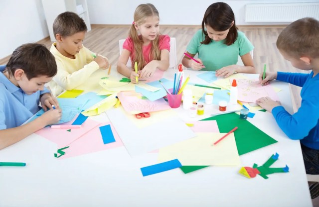 Students engaged in cooperative learning through group activities.