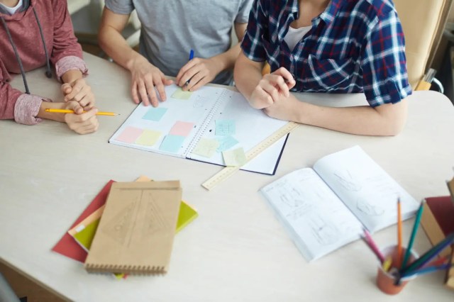 Students participating in cooperative learning in the classroom.
